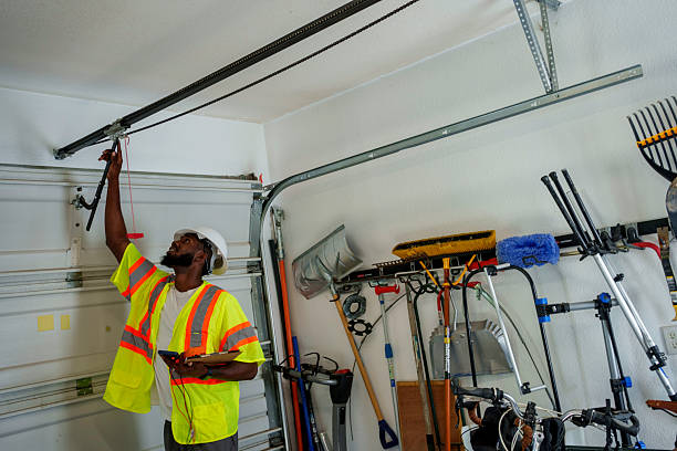 Professional Garage Door Panel Replacement technician working in Fowler, MI